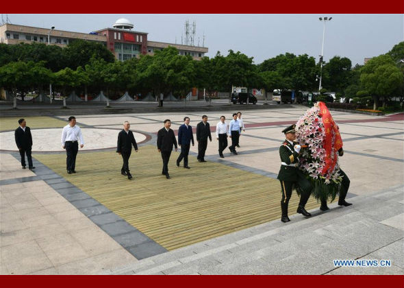 Xi Jinping Lays Floral Basket at Monument Marking Departure 